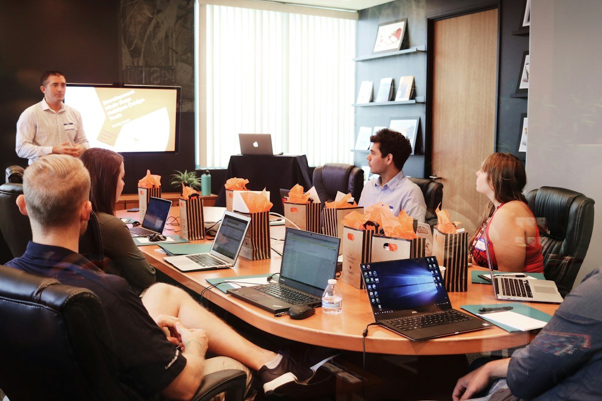 Marketing team meeting around a conference table